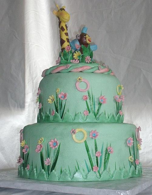 Safari or Zoo Themed Green, Pink, and Yellow Baby Shower Cake with edible Giraffe, Monkey, and Circus Elephant main view