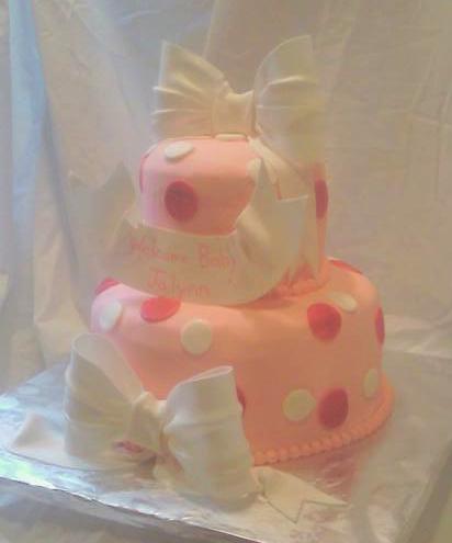 Pink Cake With Polka Dots and edible gumpaste White Bows and banner View 1