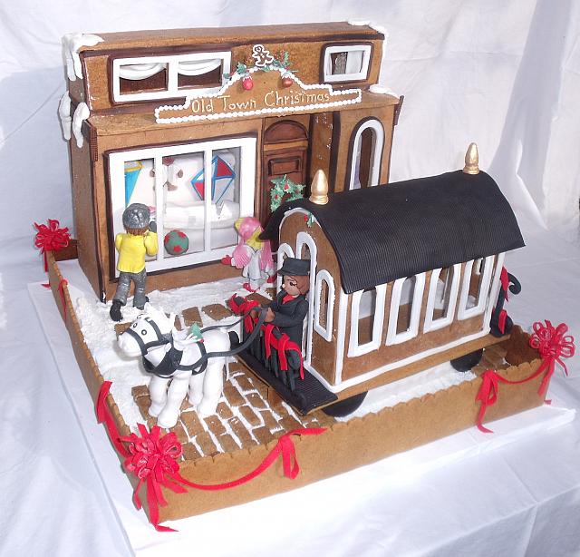 main view of gingerbread creation with all edible gumpaste, fondant, gingerbread, royal icing decorations