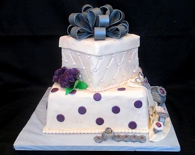 PresentFondantCakeWithBowJewelryCarnationsFront