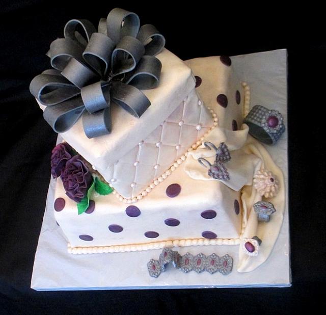 PresentFondantCakeWithBowJewelryCarnationsTop