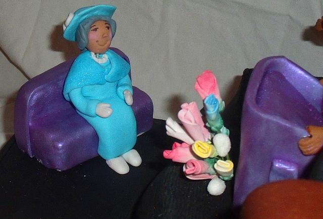 Church Scene with Female Congregation Gumpaste Figurine in Blue Dress Close Up
