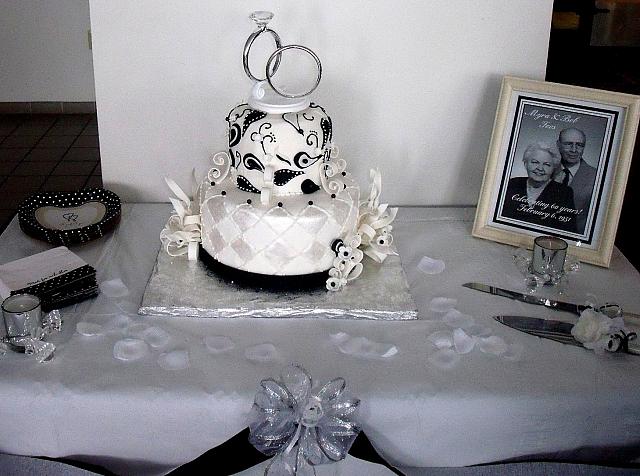 Anniversary Paisley Streamers Black White Fondant Cake on table