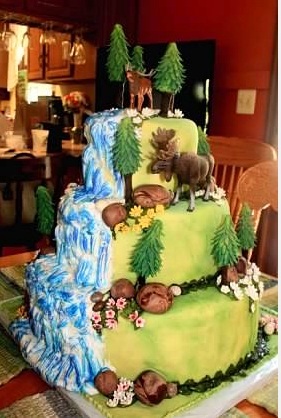 WeddingCakeOutdoorsThemeWithTwoPlasticAnimals