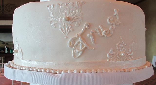 White On White Wedding Cake Writing on Middle Tier Close Up