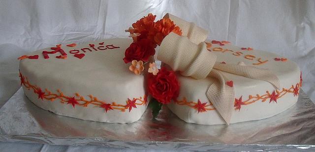 Wedding Cake of Two Hearts,  Red Gumpaste Roses,  Orange Hydrangea Gumpaste Flowers, side view
