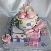 Whimsical Pink, Green, and Purple Baby Shower with Edible Shoes, Safety Pins, Baby Bottle and Bow