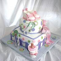 Whimsical Baby Shower Cake in Pink, Green, and Purple with Edible Gumpaste baby Shoes, Baby Bottle, and Safety Pins view 2
