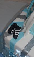 Edible gumpaste soccer shoes decoration close up