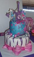 Hannah Montana Cake with Microphone, Exploding Stars, Zebra Stripes, and Large Bow side view