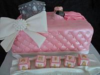 Baby Shower Princess Theme Fondant Cake with Crown, Quilted Sides, Baby Blocks, 
Edible Sleeping Baby, Jeweled Bow front view