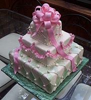 Present Fondant Cake with Harlequin Side Design and Pink Bow