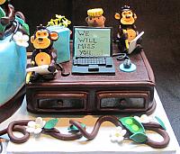 Retirement Desk With Monkeys Computer Animal Crackers Jar Books Flower Vase Front