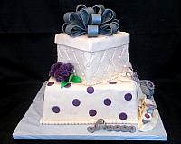 PresentFondantCakeWithBowJewelryCarnationsFront