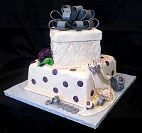 PresentFondantCakeWithBowJewelryCarnationsSide