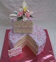 feminine birthday cake with single serving already cut and decorated