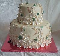 Ivory Anniversary Cake with Asian Floral Brocade decorations