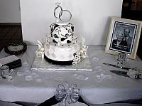 Anniversary Paisley Streamers Black White Fondant Cake on table