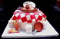 Pizza and Italian Food Themed Fondant Cake with Edible Chef Hats, Copper Pots, Grapes, Spagetti front view
