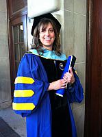 Lora M. graduating with PhD