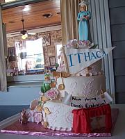 Graduation Cake with edible people front view.  Notice the broadway stage and college banner, all made out of edible gumpaste.  All figurines on cake are edible.