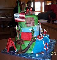 View of the tents, American flag, dining hall, Camp Road decorations.
