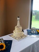 LighthouseThemeIvoryWeddingCakeAtGolfCourse