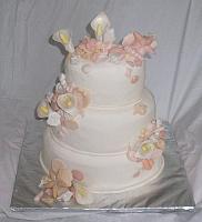 Oval Shaped Nautical Shell Wedding Cake with Calla Lilies