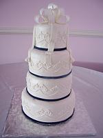 Simple White Fondant covered Wedding cake