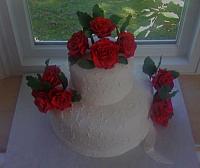 One Dozen Red Roses On White fondant-covered Cake